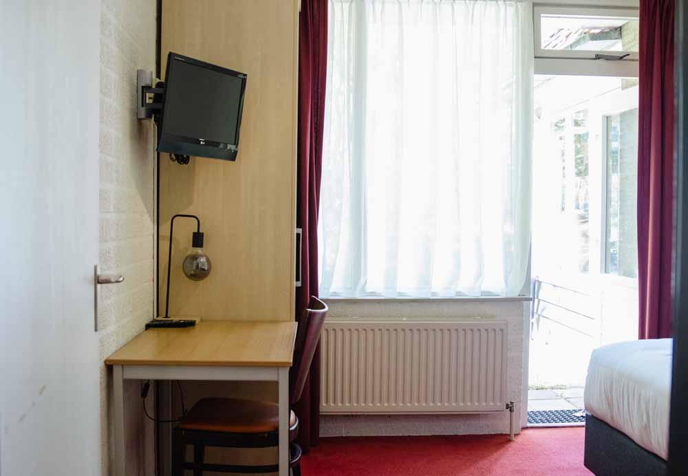 sfeervolle hotelkamer buitengoed fredeshiem aanbieding